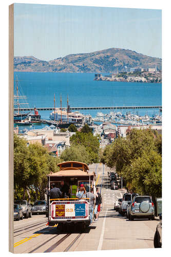 Quadro de madeira Tram with Alcatraz island in the background, San Francisco, USA