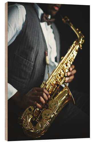 Wood print Saxophone held by a jazzman