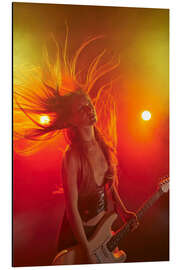 Aluminium print Rock girl playing the electric guitar