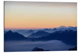 Quadro em alumínio Distant mountain layers at sunrise. View from Brienzer Rothorn over swiss alps