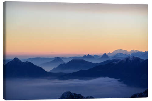 Canvas print Distant mountain layers at sunrise. View from Brienzer Rothorn over swiss alps