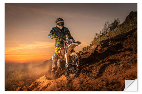 Sisustustarra Enduro rider climbing a slope