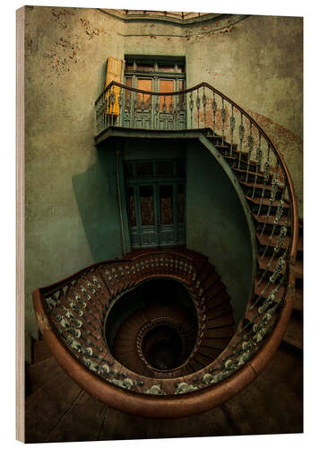 Wood print Spiral staircase in an old building