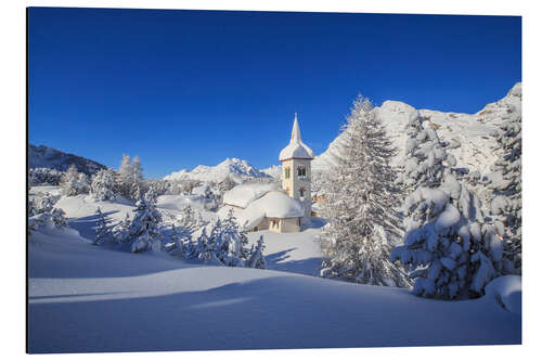 Aluminium print The winter sun illuminates the snowy landscape