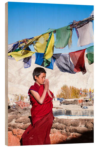 Obraz na drewnie Young buddhist monk praying, Nepal, Asia