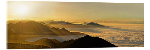 Quadro em acrílico Mountain peak over the clouds