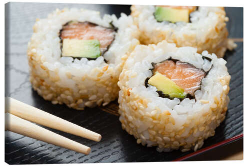 Lærredsbillede Sushi on wooden plate with chopsticks