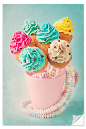 Sticker mural Colorful cupcake pops on blue background