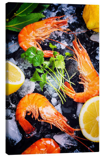 Canvas print Tiger prawns on ice with lemon and herbs