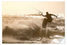 Selvklebende plakat Kitesurfer jumping on a beautiful background