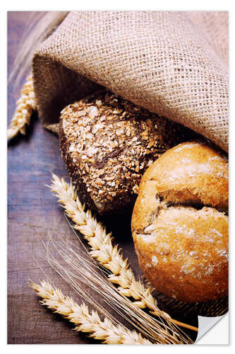 Selvklebende plakat Freshly baked bread on wooden table