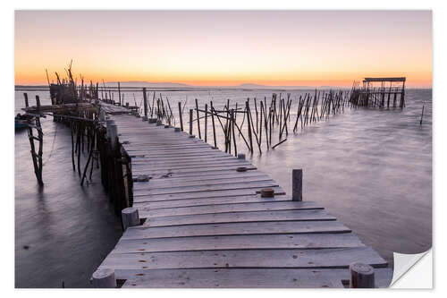 Självhäftande poster Sunset at Palafito Pier of Carrasqueira, Setubal, Portugal