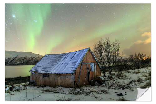 Muursticker Aurora Borealis on typical Rorbu, Svensby, Norway