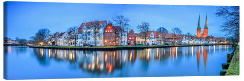 Tableau sur toile Panoramic of Lubeck reflected in river Trave, Germany