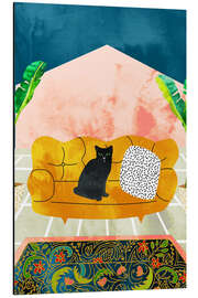 Alubild Schwarze Katze auf gelbem Sofa
