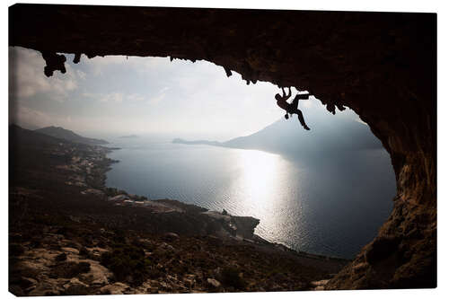 Canvas print Silhouette of a climber at sunset