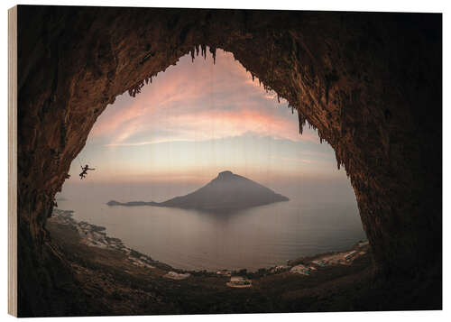 Quadro de madeira Climber on Telendos island at sunset