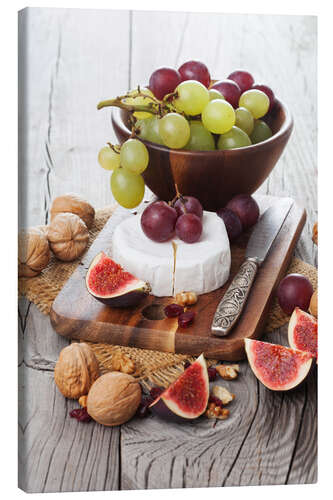 Canvas print Camembert cheese with figs, nuts and grapes