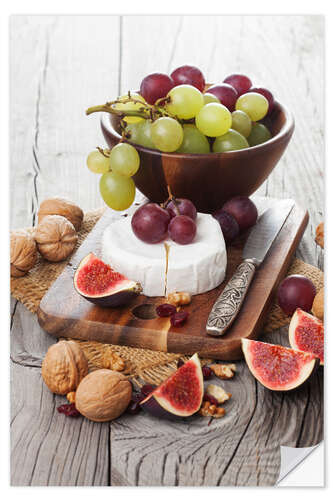 Naklejka na ścianę Camembert cheese with figs, nuts and grapes