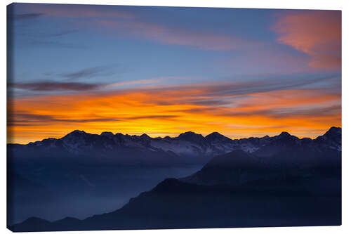 Canvastavla Colorful sky at sunset over the Alps