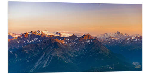 Foam board print Sunset over rocky mountain peaks, ridges and valleys, the Alps