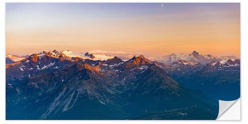 Selvklebende plakat Sunset over rocky mountain peaks, ridges and valleys, the Alps