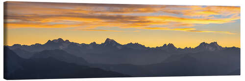 Leinwandbild Die Alpen bei Sonnenuntergang, Panoramablick