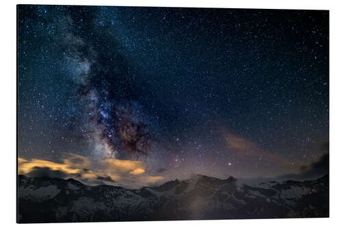 Cuadro de aluminio The Milky Way galaxy glowing over snowcapped mountains in the Alps