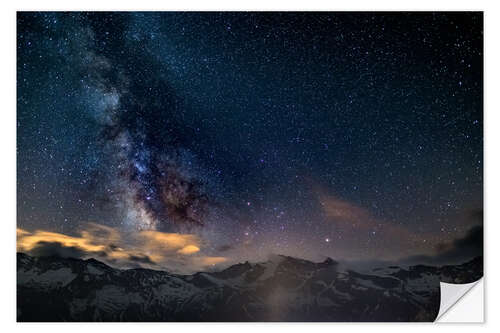 Vinilo para la pared The Milky Way galaxy glowing over snowcapped mountains in the Alps