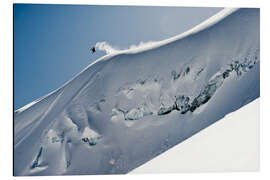 Alumiinitaulu Freeriding snowboarder on a snowy slope