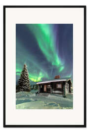 Gerahmter Kunstdruck Northern Lights frame a wooden hut