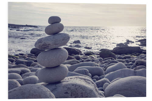 Foam board print Pyramid of pebbles on the sea front