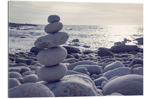 Gallery print Pyramid of pebbles on the sea front