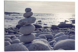 Gallery print Pyramid of pebbles on the sea front