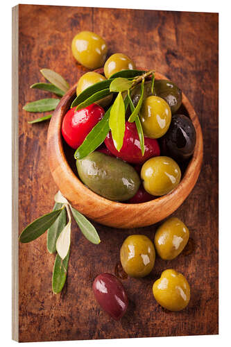 Wood print Bowl with olives on a wooden table