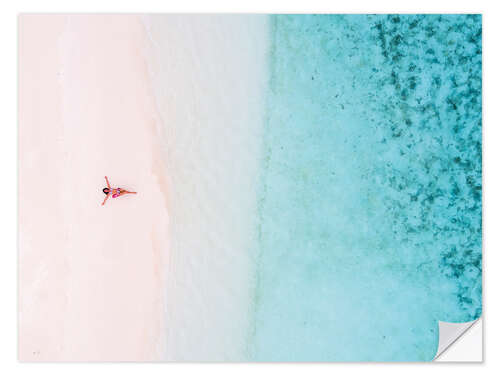 Naklejka na ścianę Aerial view of woman on a tropical beach