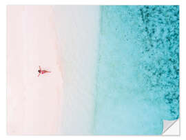 Naklejka na ścianę Aerial view of woman on a tropical beach