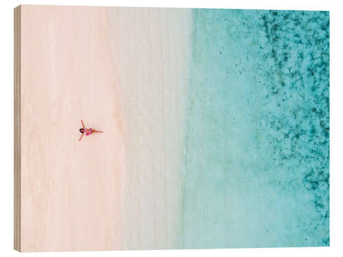 Wood print Aerial view of woman on a tropical beach