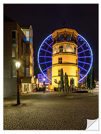 Sisustustarra Castle tower in Dusseldorf with blue ferris wheel