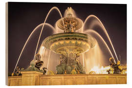 Quadro de madeira Parisian fountain at Place de la Concorde at night