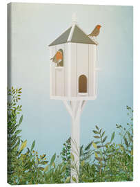 Leinwandbild Vogelhaus mit Rotkehlchen
