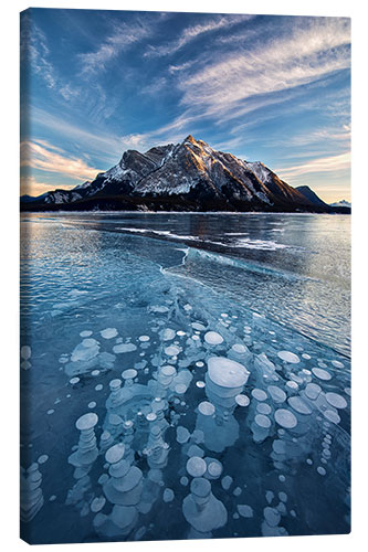 Leinwandbild Eisblasen im See bei Sonnenuntergang