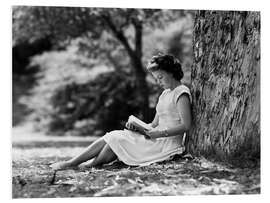 Foam board print Woman reading under a tree