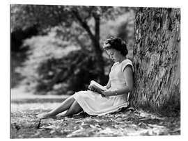 Gallery print Woman reading under a tree