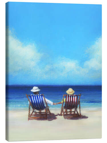 Tableau sur toile Couple assis sur la plage se tenant la main