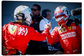 Leinwandbild Sebastian Vettel und Charles Leclerc feiern im Parc fermé