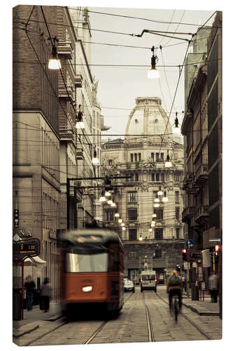 Canvas print Tram on a street in Milan