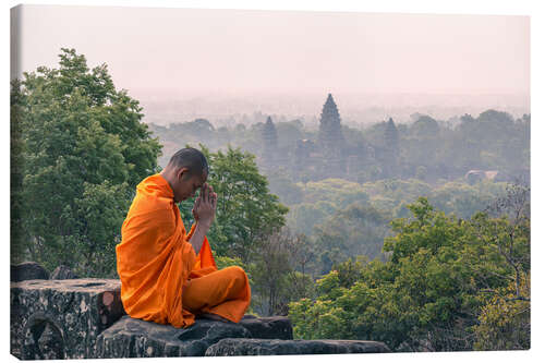 Canvas print Monk meditating at Angkor Wat