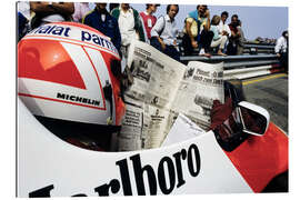 Galleritryk Niki Lauda reads a newspaper in his cockpit, Dutch GP 1984