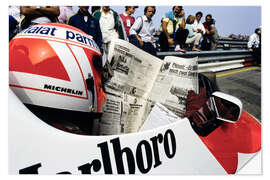 Selvklebende plakat Niki Lauda reads a newspaper in his cockpit, Dutch GP 1984